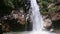 Closeup Mountain River Waterfall Falls into Lake among Rocks