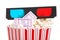 Closeup movie tickets popcorn and 3D glasses
