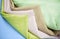 Closeup multicolor linen cloth fabrics in stack