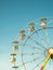 Closeup of a multicolored Ferris wheel in the amusement park