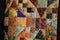 Closeup multicolored squares and triangles Amish Handmade Quilt2