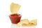 Closeup nacho corn chips with bowl of salsa