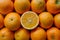 Closeup of natural oranges, vibrant citrus fruit Closeup