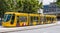 Closeup of new yellow low floor Tram in Melbourne, Australia