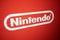 Closeup on Nintendo logo photographed from site screen