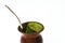 Closeup of an old gourd with yerba mate and stainless steel pump used to prepare chimarrÃ£o, traditional in southern Brazil.