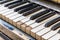 Closeup of old piano keyboard shallow focus