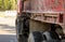 Closeup of old rusty and dirty truck side, paint peeling on car