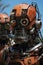 Closeup of an old rusty robot in the garden,  Technology concept