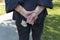 Closeup of an old woman`s hands joined , focus on hands