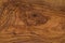 Closeup olive wood texture with oil finish