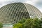 Closeup of One dome of Esplanade Theatres under heavy cloudscape, Singapore