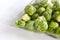 Closeup of organic brussels sprouts in plastic