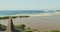 Closeup ornated roofs houses at traditional village on sand ocean coast aerial. Nature landscape