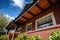 closeup of overhanging eaves on a brick craftsman house