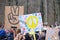 Closeup on packard with with pacific sign on Ukrainian and Russian flags. Protest against war in Ukraine.