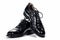 Closeup of Pair of Formal Male Stylish Black Polished Oxford Leather Laced Shoes Placed Together Over White