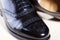 Closeup of Pair of Male Stylish Black Polished Oxford Semi-Brogu