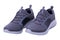 Closeup of a pair of modern silver gray sneakers or sports shoes isolated on a white background. Clipping path. Elegant and trendy