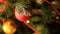 Closeup panning slow motion video of beautiful baubles, beads and garlands on Christmas tree. Perfect shot for winter