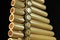 Closeup of a panpipe under the lights isolated on a black background