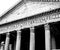 Closeup of pantheon temple entrance facade in black and white , historic ancient architecture of Rome , Italy