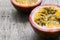 Closeup passion fruit with slice on wooden background, fruit healthy concept