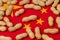 Closeup of peanuts in shell on flag of China. Concept of peanut farming, trade, tariffs and market price