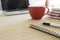 Closeup pen and blur background of startups business people working desktop.