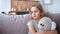 Closeup pensive little cute girl hugging teddy bear at home suffering loneliness lost parents