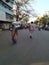 Closeup of People Crowd or Queue in front of the Mobile Indira Canteen to collect food by poor people