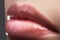 Closeup perfect natural lip makeup. Beautiful plump full lips on female face. Clean skin, fresh make-up. Spa tender lips