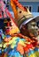 closeup of a person in mask and costume during Carnaval Curacao 2023