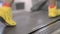 Closeup of a person\\\'s yellow sneakers at a treadmill