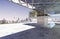 Closeup and perspective view of empty cement floor with modern steel and glass building exterior