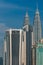 Closeup of Petronas Towers and Tabung Haji Tower (Menera). Kuala Lumpur, Malaysia