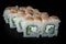 Closeup philadelphia roll sushi with cucumber, cream cheese and tiger shrimp on top