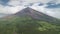 Closeup Philippines volcano haze eruption aerial. Green grass landmark of Mayon mountain