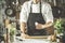 Closeup photo of baker cracking egg for dough. Retro styled imagery