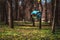 Closeup photo of bird feeder in park or forest in sun light captured by early spring.