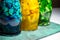 Closeup photo, bright color fruit paited lemonade, wooden board