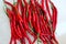 Closeup photo of Curly red chillies pepper Cabai merah keriting