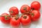 Closeup photo with delicious organic small red tomatoes