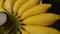 Closeup photo of fresh yellow bananas are placed on the bench. Yellow bananas as background..