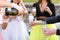 Closeup photo of girls celebrating a bachelorette party with bride