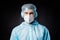 Closeup photo of handsome guy expert doc virology center covid19 protection wear respiratory mask hazmat blue uniform