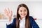 Closeup photo of little charming cheerful student school girl sitting desk social distancing quarantine continue