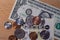 Closeup photo of lottery tickets of Power Ball with dollar bill and coins