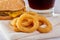 Closeup photo of a pile of onion rings