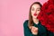 Closeup photo of pretty charming lady enjoy large one hundred roses bouquet standing side sending kisses empty space